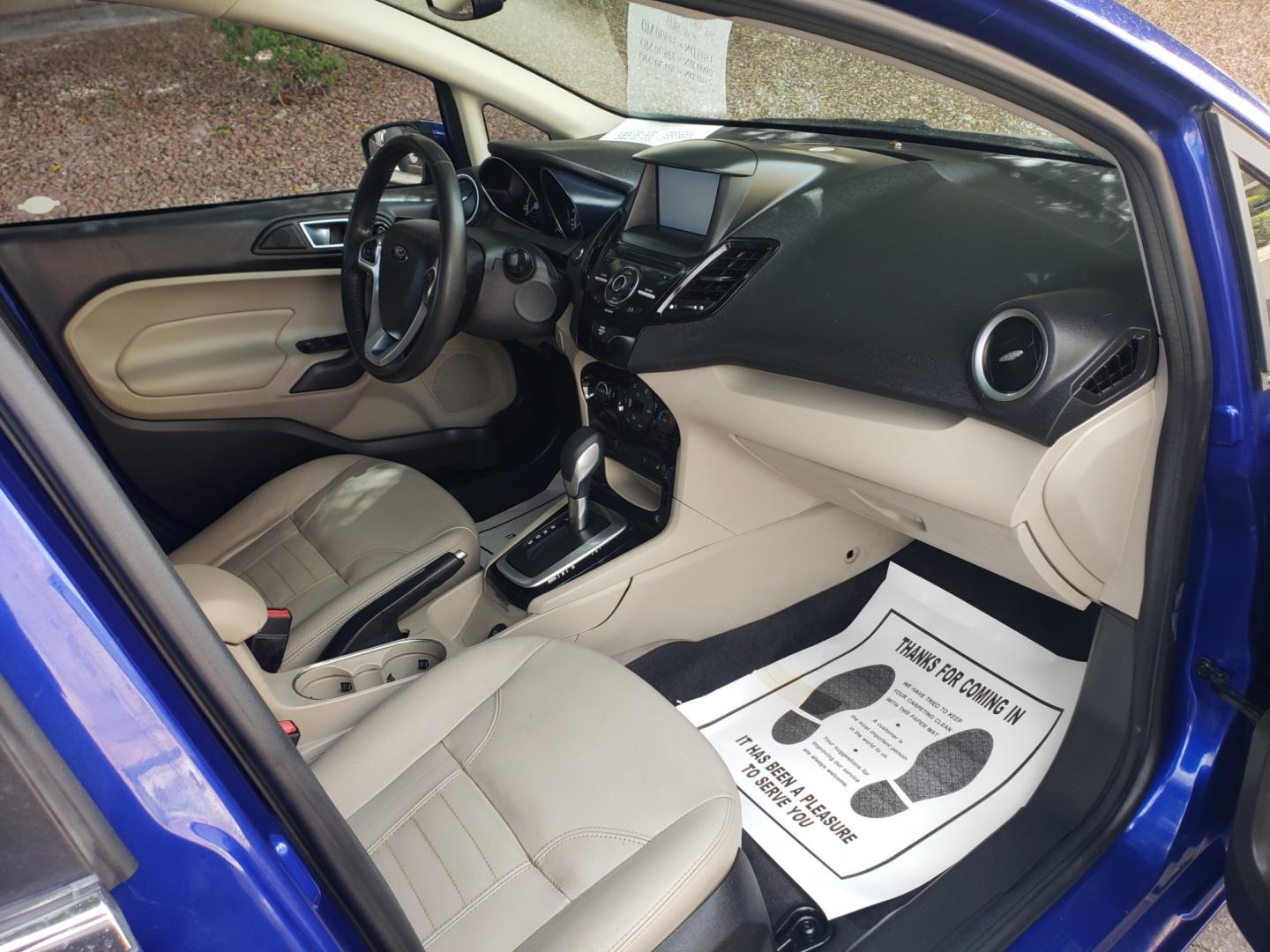 2014 /Tan and black Ford Fiesta Titanium (3FADP4FJ5EM) with an 1.6l i4 engine, 6-Speed Automatic transmission, located at 323 E Dunlap Ave., Phoenix, AZ, 85020, (602) 331-9000, 33.567677, -112.069000 - 2014 Ford Fiesta Titanium,.......A Must See!!... No accidents, Only 95K MILES.... Ice cold AC. The car is gorgeous inside and out. Power windows, Power door locks, Touch screen Stereo/ CD Player, Phone sync, Bluetooth, Satellite compatible, Backup camera, Beautiful tan and black interior with tan le - Photo#13